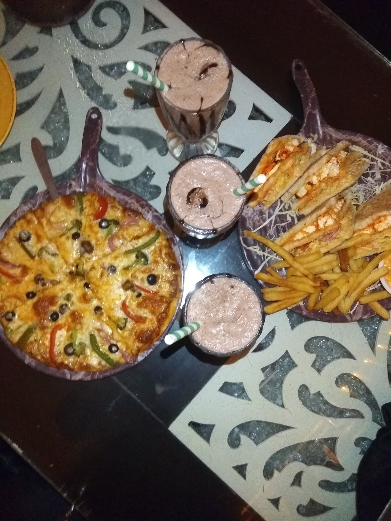 Oreo shake with a pizza sandwich